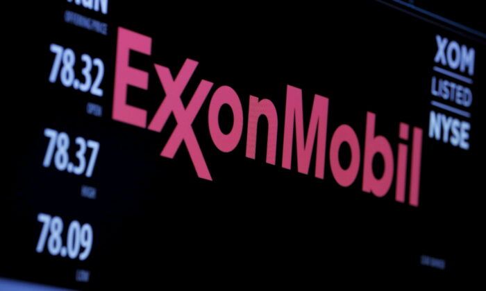 The logo of Exxon Mobil Corporation is shown on a monitor above the floor of the New York Stock Exchange in New York on Dec. 30, 2015. (Lucas Jackson/Reuters)