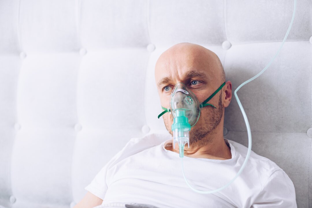 Respiratory problems can accompany a severe COVID infection. (Daniel Jedzura/Shutterstock)