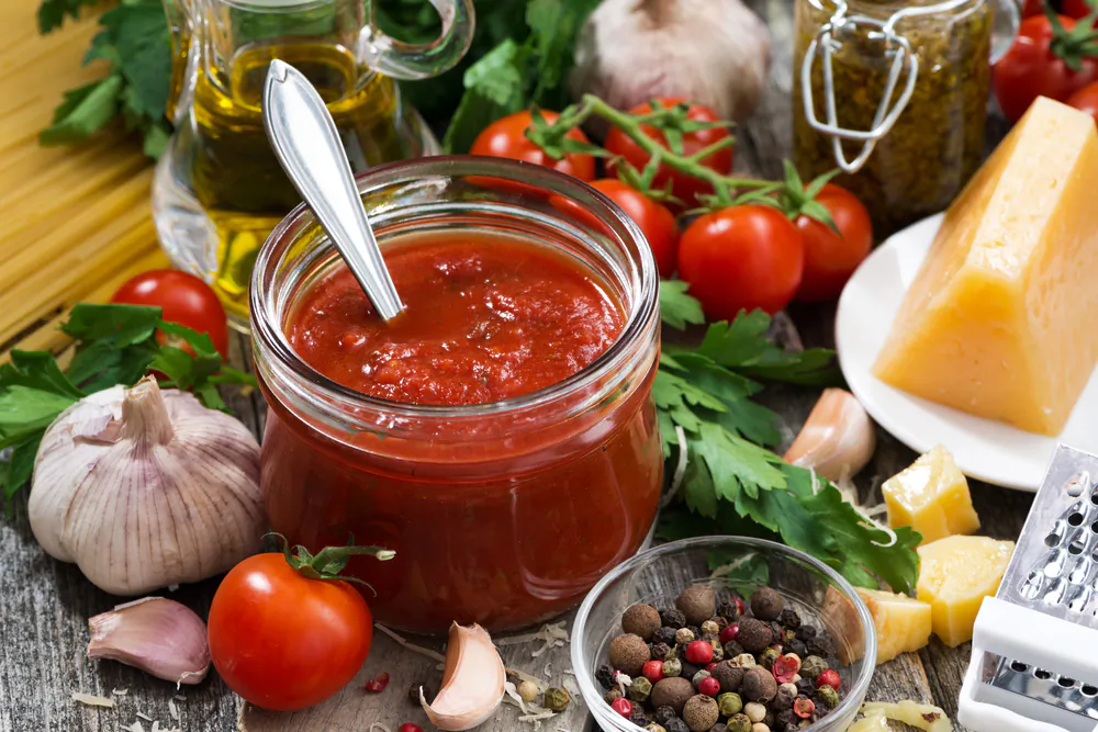 This no-nonsense, faux summer sauce is a bright and fresh condiment to splash on pasta, smear on pizza, or layer into baked dishes at any time of year.   (Yulia Davidovich/Shutterstock)