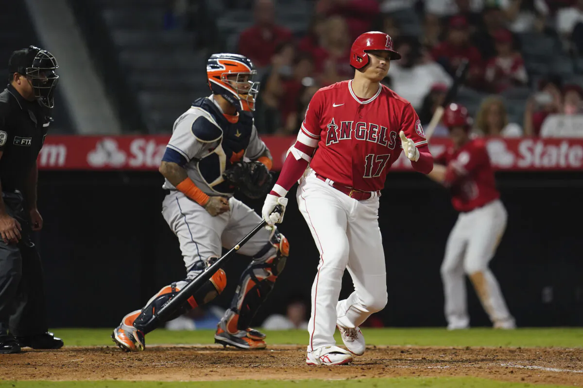 Los Angeles Angels' Shohei Ohtani (17) strikes out during the sixth inning of a baseball game against the Houston Astros in Anaheim, Calif., on Sept. 20, 2021. (AP Photo/Marcio Jose Sanchez)
