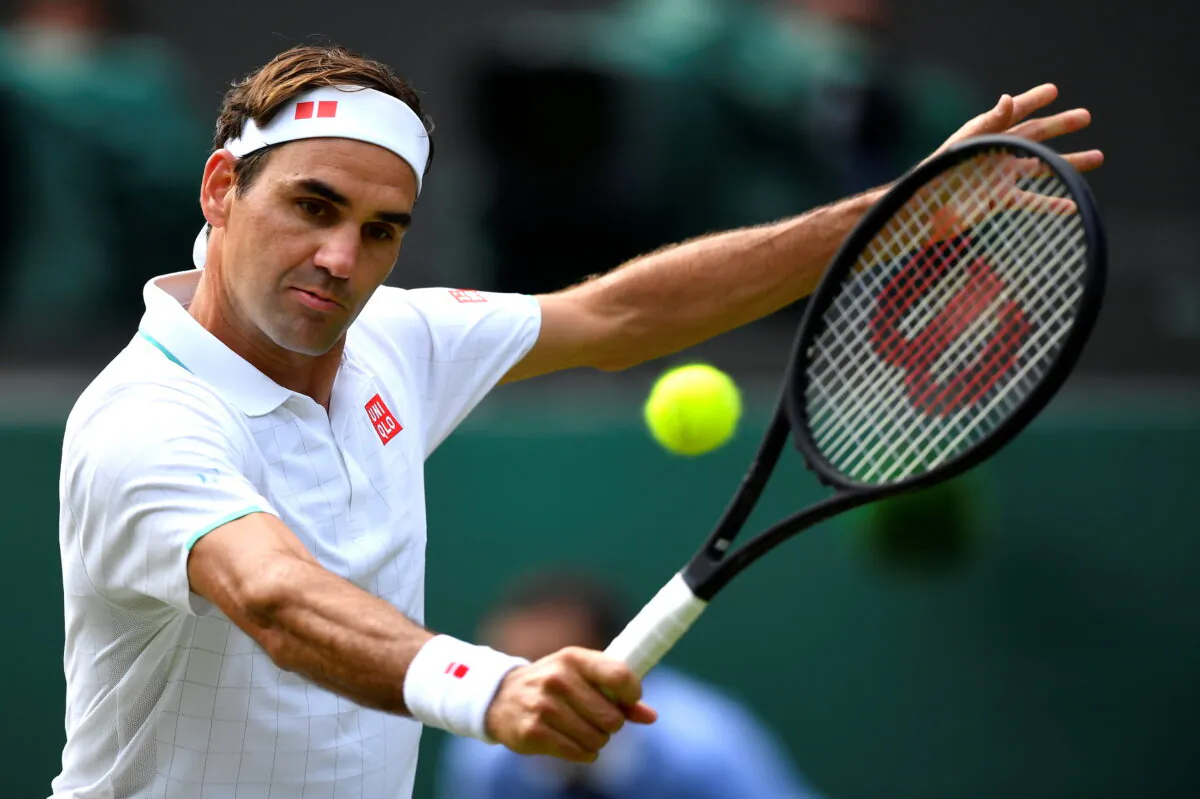 Switzerland's Roger Federer in action during his third round match against Britain's Cameron Norrie, at Wimbledon, England, on July 3, 2021. (Toby Melville/Reuters)