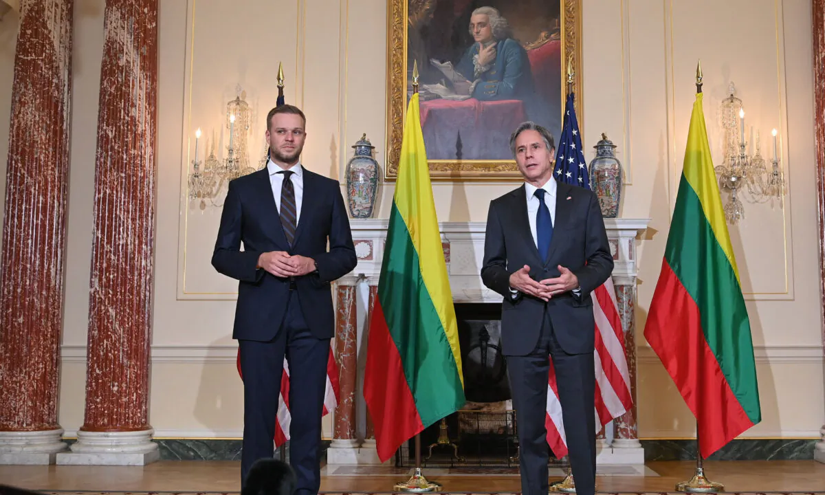 U.S. Secretary of State Antony Blinken (right) speaks with Lithuania's Foreign Minister Gabrielius Landsbergis in the Benjamin Franklin Room of the State Department ahead of a meeting in Washington, on Sept. 15, 2021. (Mandel Ngan/Pool/AFP via Getty Images)