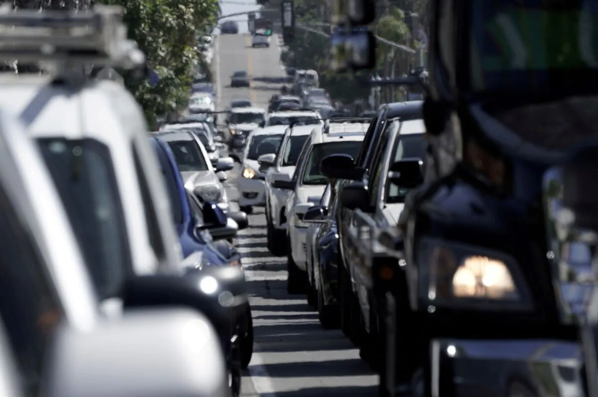 Heavy vehicular traffic is seen in the Ocean Beach neighborhood of San Diego, Calif., ahead of the Fourth of July holiday on July 3, 2020. (Bing Guan/Reuters)