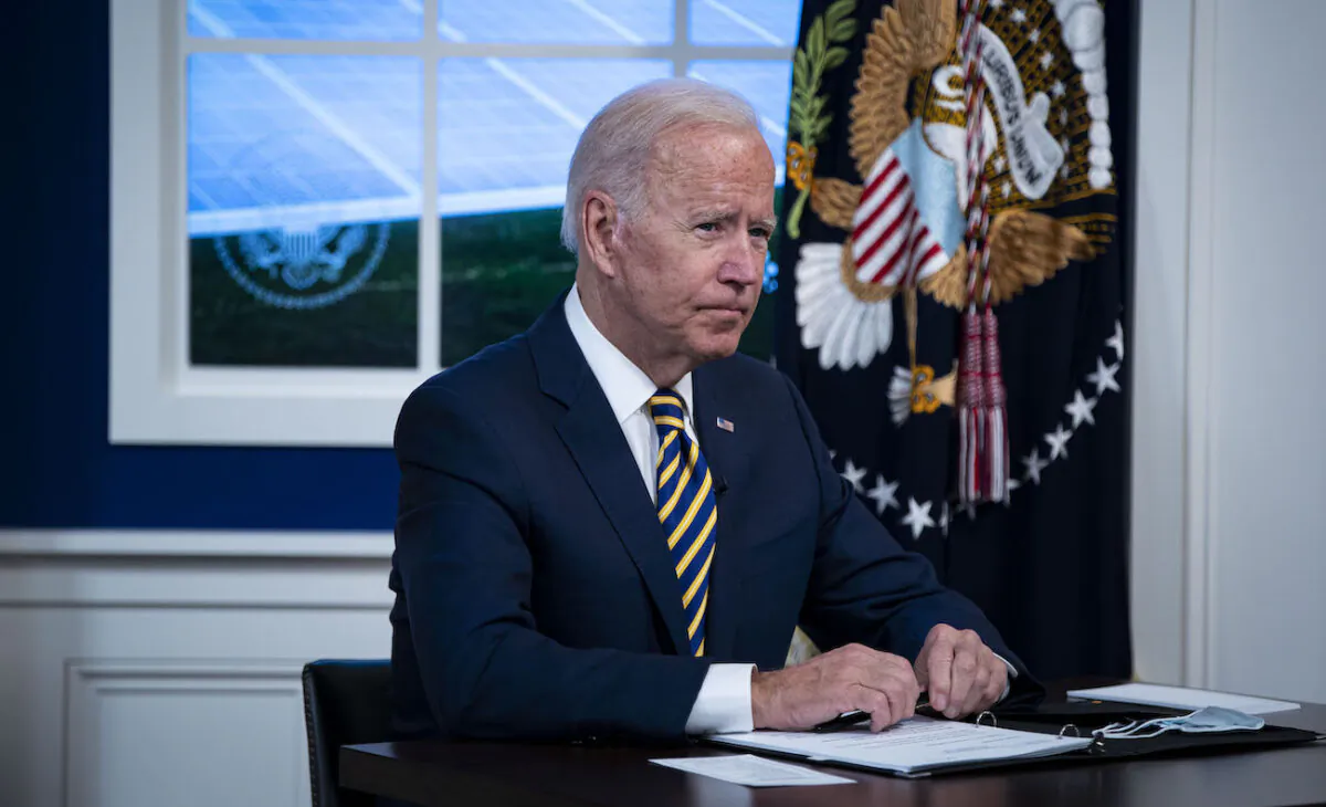 President Joe Biden participates in a conference call with the Major Economies Forum on Energy and Climate in the South Court Auditorium in the Eisenhower Executive Office Building in Washington, on Sept. 17, 2021. (Al Drago/Getty Images)