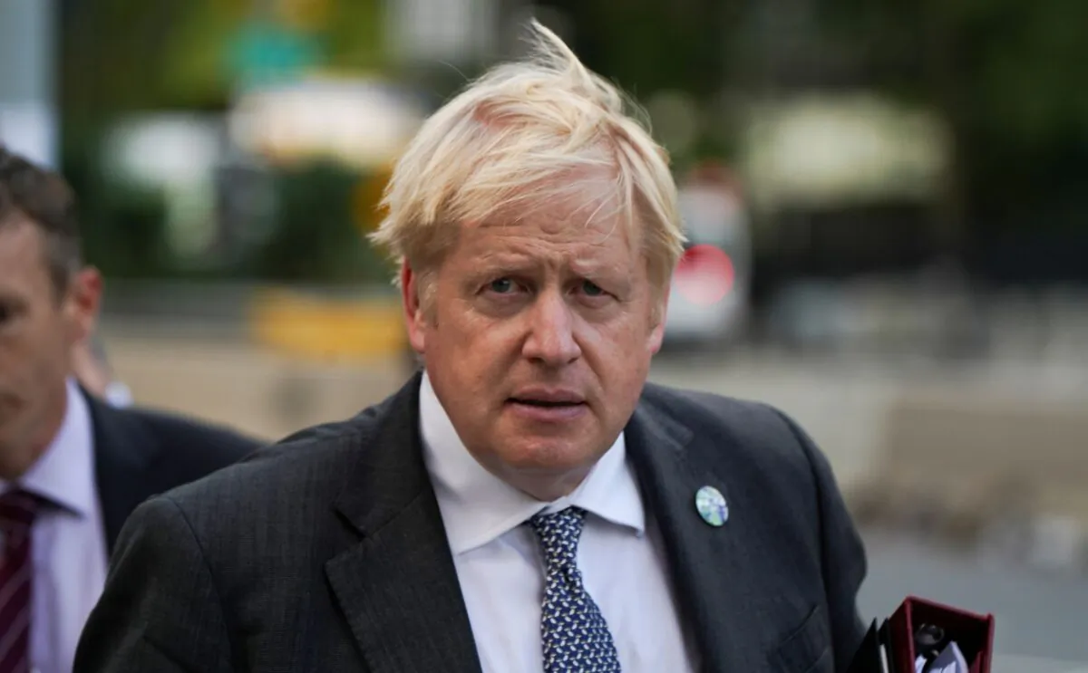 British Prime Minister Boris Johnson walks outside United Nations headquarters in New York on Sept. 20, 2021. (David 'Dee' Delgado/Reuters)