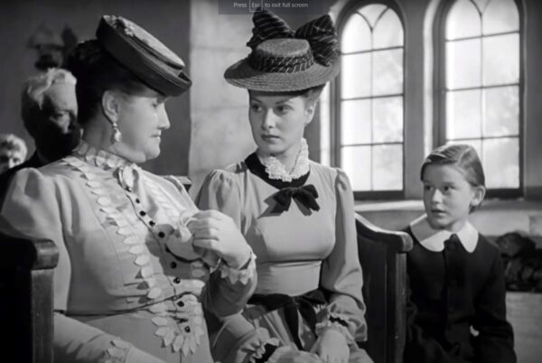 two women and a boy in church