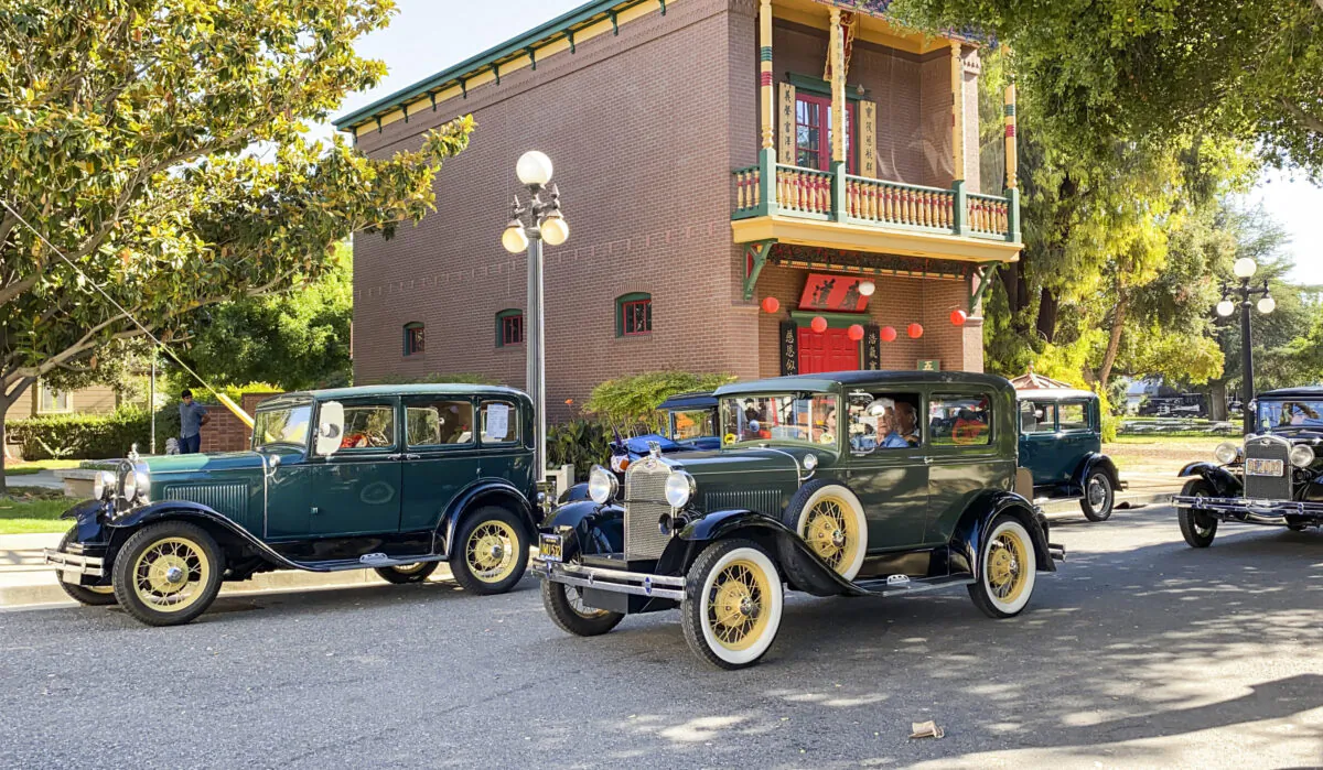 Antique cars line the street in front of the Chinese American Historical Museum at the Ng Shing Gung during Antique Autos in History Park in San Jose, Calif., on Sept. 19, 2021. (Ilene Eng/The Epoch Times)