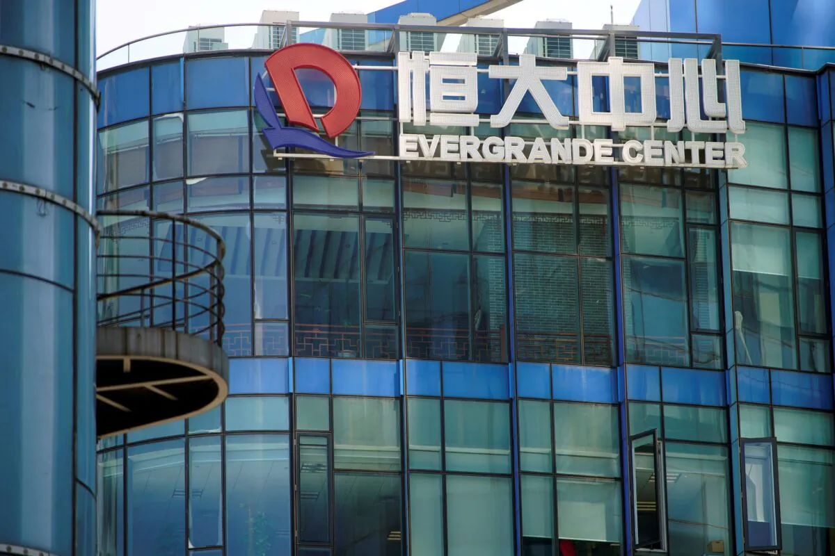 The logo of China's Evergrande Group seen on the Evergrande Center in Shanghai, on Sept. 22, 2021. (Aly Song/Reuters)