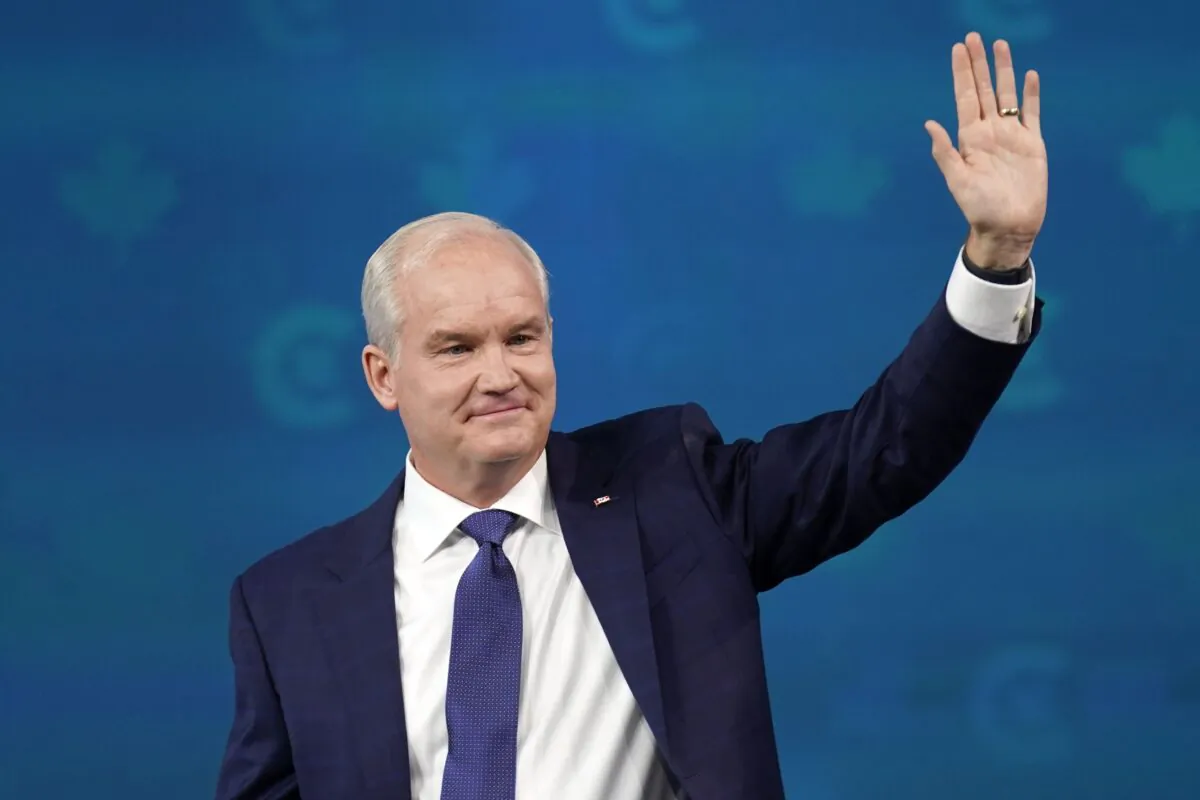 Conservative Party Leader Erin O'Toole waves after giving his concession speech at his election night headquarters in Oshawa, Ont., on Sept. 21, 2021. (The Canadian Press/Adrian Wyld)