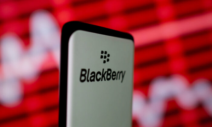 The Blackberry logo is seen on a smartphone in front of a displayed stock graph in this illustration taken on Feb. 5, 2021. (Dado Ruvic/Illustration/Reuters)