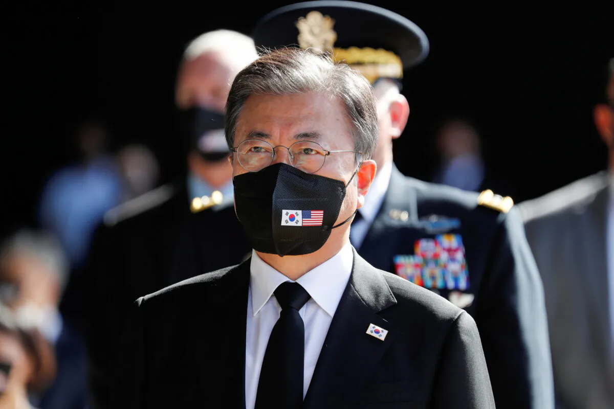 South Korea's President Moon Jae-in attends the first joint repatriation ceremony for Korean War remains at Joint Base Pearl Harbor-Hickam near Honolulu, Hawaii, U.S. on Sept. 22, 2021.  (Marco Garcia/Reuters File Photo)