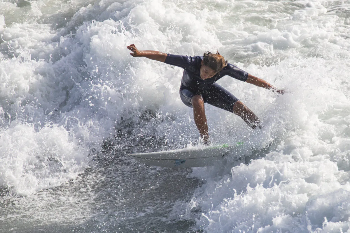 A surfer practices for the US Open of Surfing in Huntington Beach, Calif., on Sept. 22, 2022. (John Fredricks/The Epoch Times)
