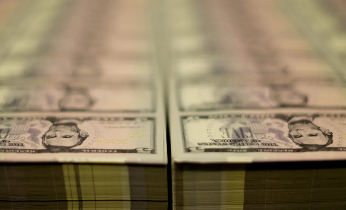 Stacks of former U.S. President Abraham Lincoln on the five-dollar bill are seen at the Bureau of Engraving and Printing in Washington, on March 26, 2015. (Gary Cameron/Reuters)