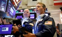 Wall Street Ends Higher as Fed Signals Bond-Buying Taper Soon