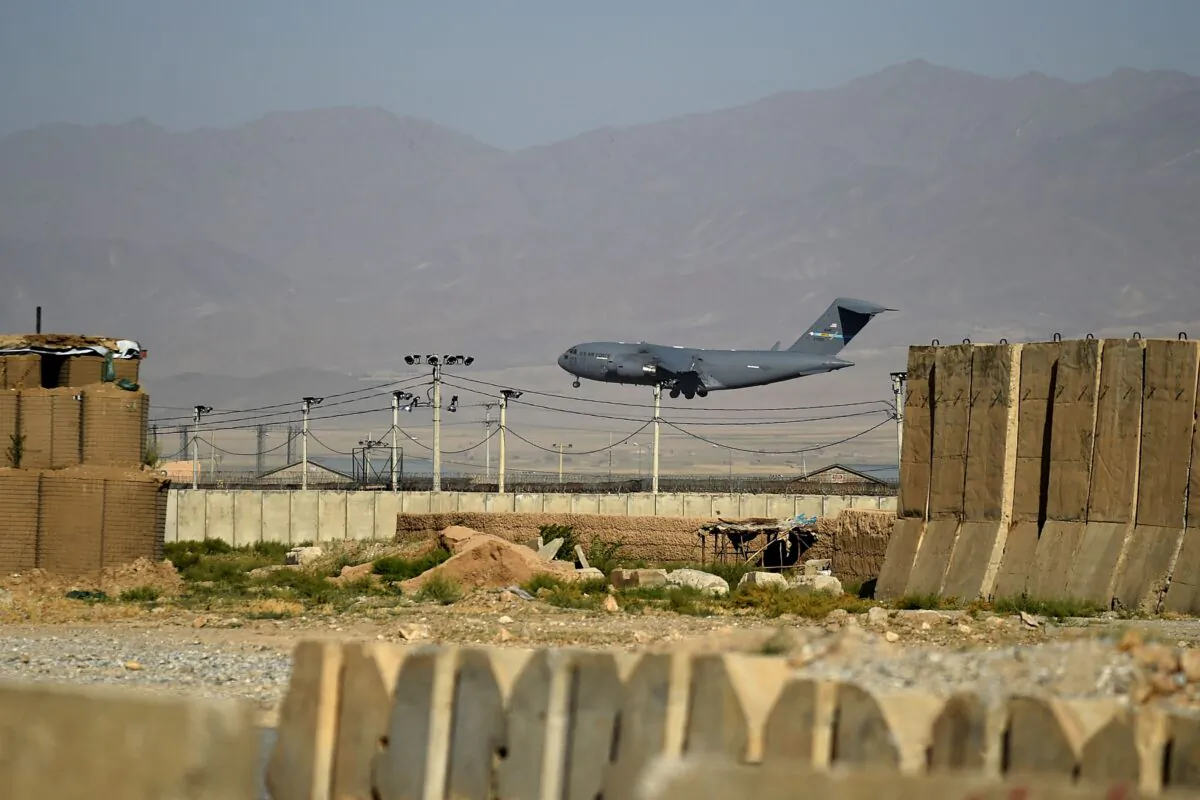A U.S. Air Force transport plane lands at Bagram Airfield in eastern Afghanistan on July 1, 2021. (Wakil Kohsar / AFP via Getty Images)
