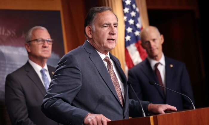 Sen. John Boozman (R-Ark.), joined by fellow Republican Senators, speaks on a proposed Democratic tax plan, at the U.S. Capitol in Washington on Aug. 04, 2021. (Kevin Dietsch/Getty Images)