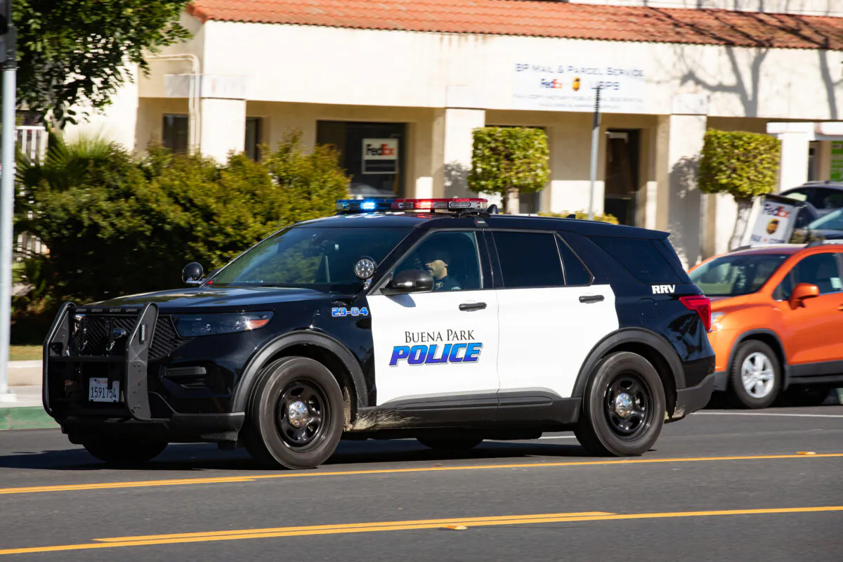 A Buena Park Police Officer responds to an emergency in Buena Park, Calif., on Jan. 15, 2021. (John Fredricks/The Epoch Times)