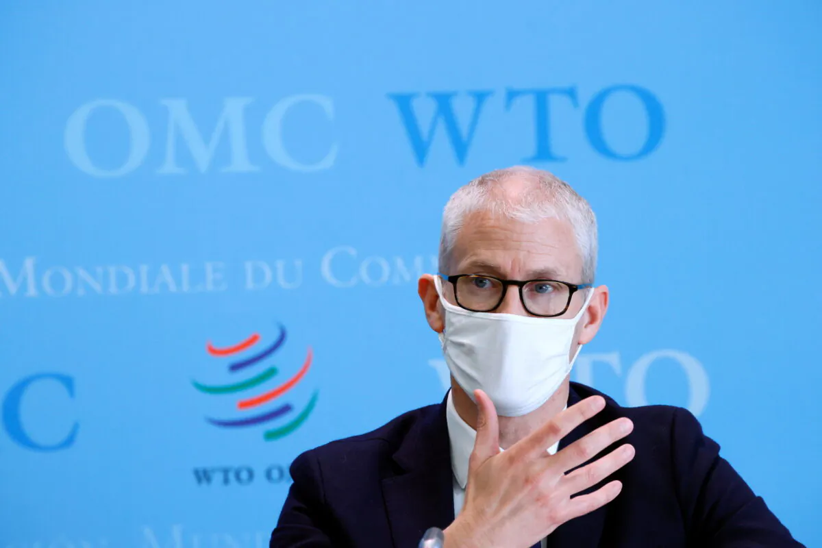 Franck Riester, France's minister delegate for foreign trade and economic attractiveness, speaks at a joint news conference with the French finance minister and WTO's director-general at WTO headquarters in Geneva, Switzerland, on April 1, 2021 (Denis Balibouse/Reuters)