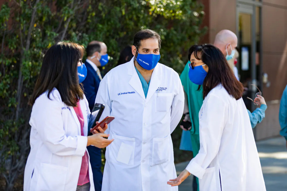 Healthcare workers at St. Joseph Hospital in Orange, Calif., on Dec. 16, 2020. (John Fredricks/The Epoch Times)