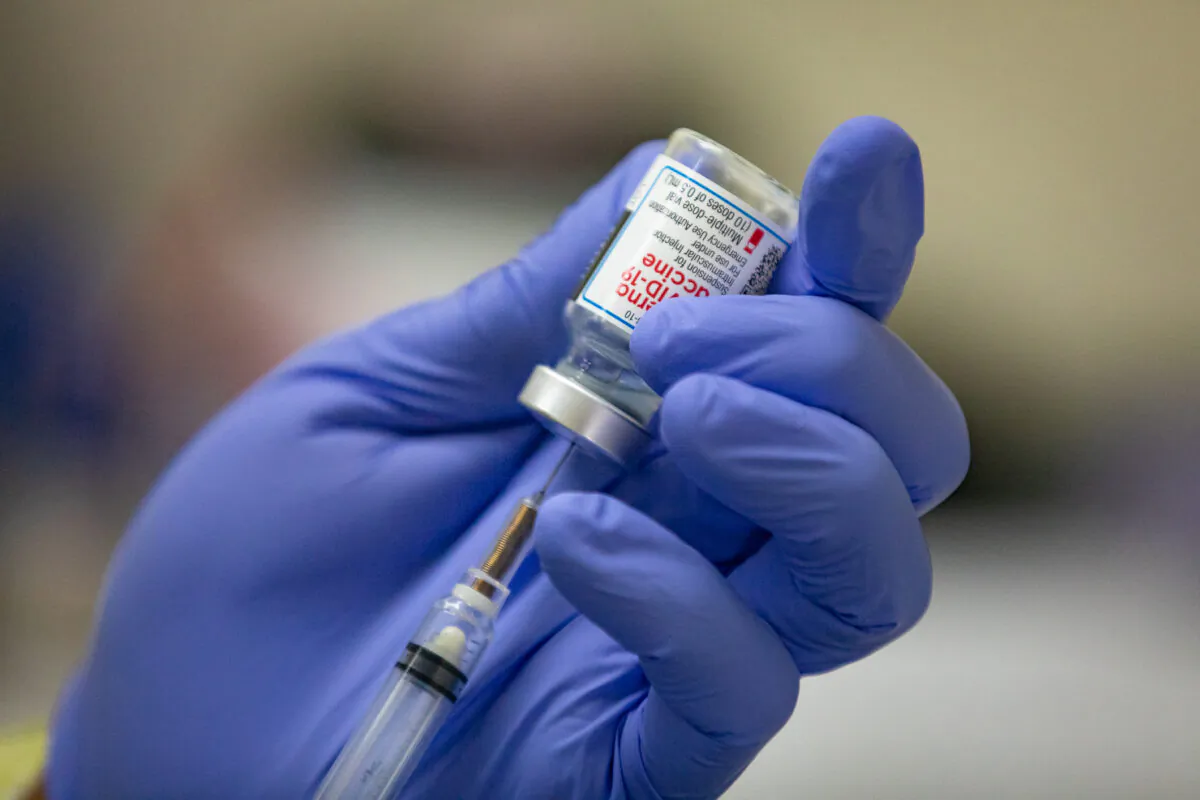 A Moderna COVID-19 vaccination prepared at Lesonnac Free Clinic in Orange, Calif., on March 9, 2021. (John Fredricks/The Epoch Times)