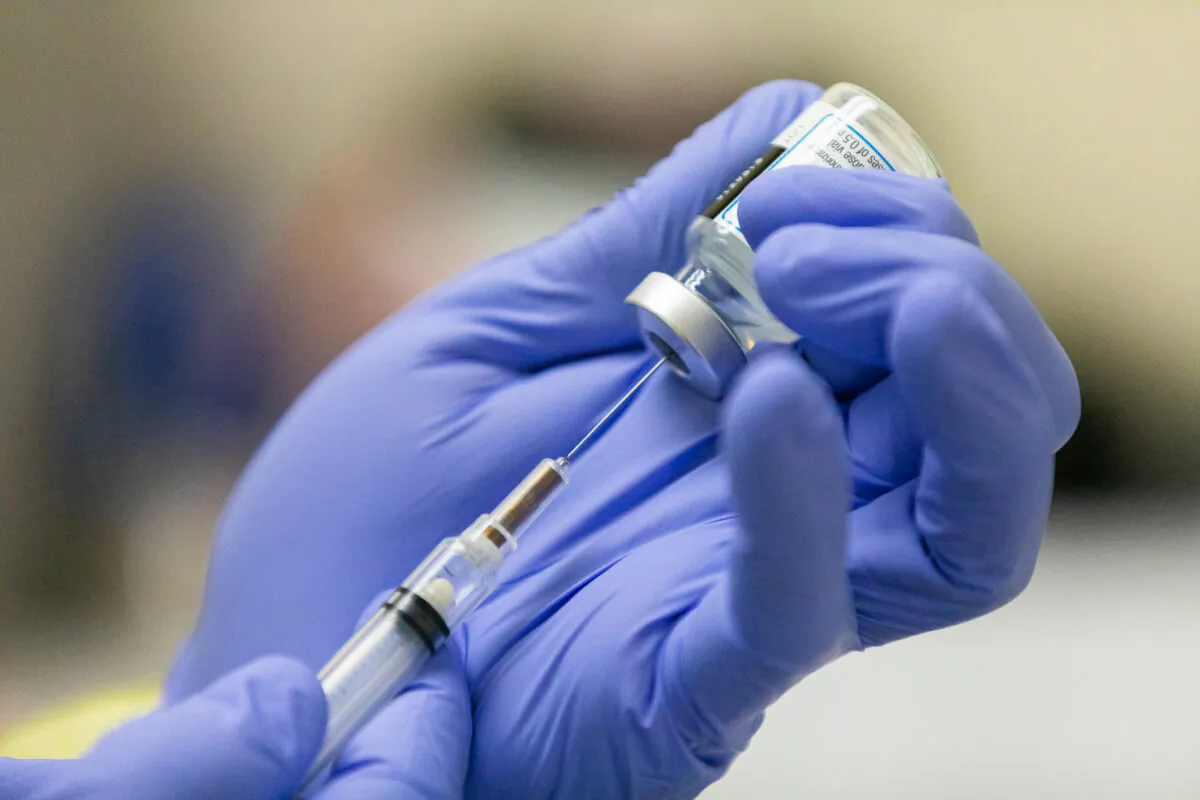 The COVID-19 Moderna Vaccination prepared at Lesonnac Free Clinic in Orange, Calif., on March 9, 2021. (John Fredricks/The Epoch Times)
