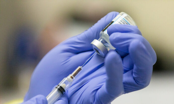 The COVID-19 Moderna Vaccination prepared at Lesonnac Free Clinic in Orange, Calif., on March 9, 2021. (John Fredricks/The Epoch Times)