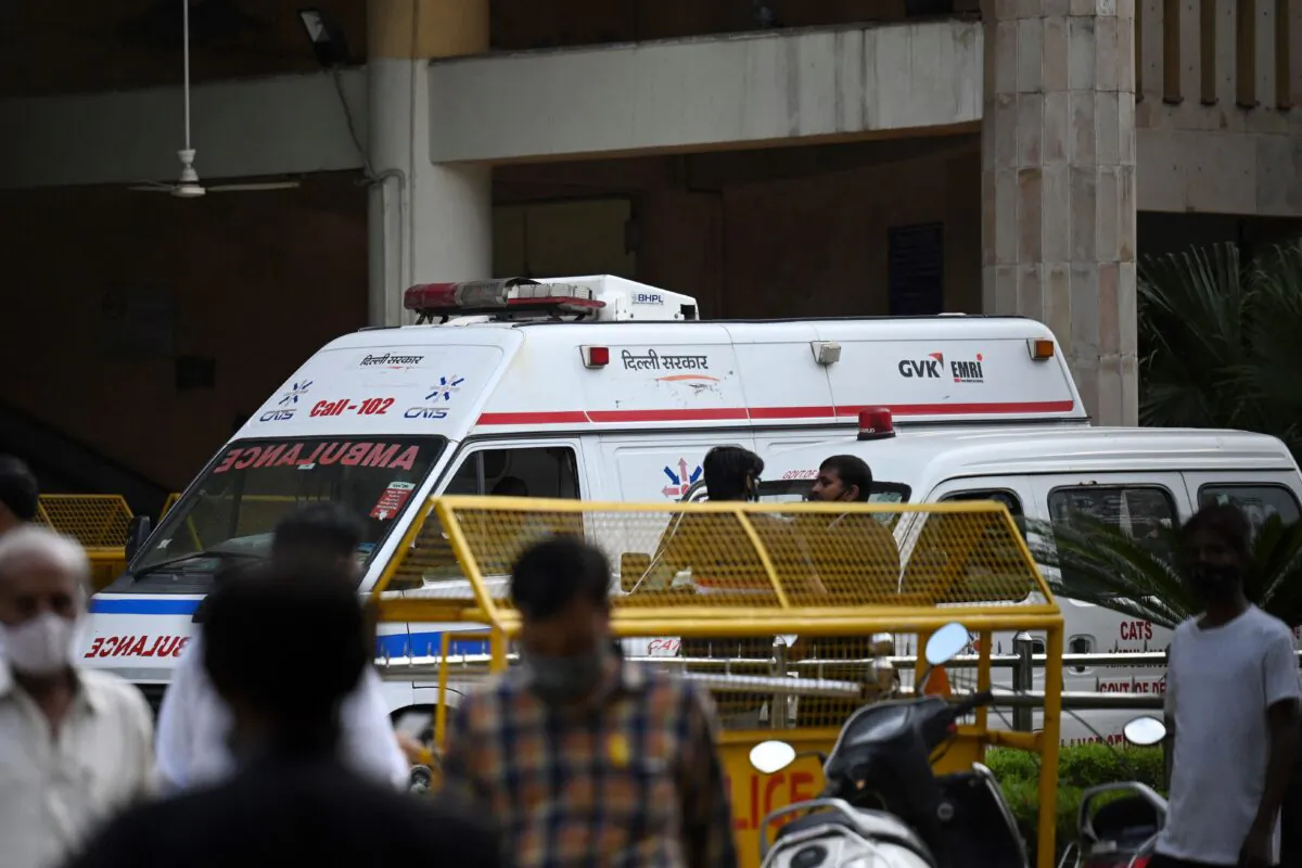 An ambulance is seen inside the Rohini court in New Delhi, India, on Sept. 24, 2021, after a notorious Indian gangster was killed by gunmen dressed as lawyers in a bloody shootout in a courtroom where three people died. (Money Sharma/AFP via Getty Images)