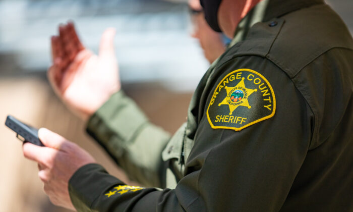 A file photo shows the uniform patch on an Orange County Sheriff's Department deputy in Orange, Calif., on March 30, 2021. (John Fredricks/The Epoch Times)