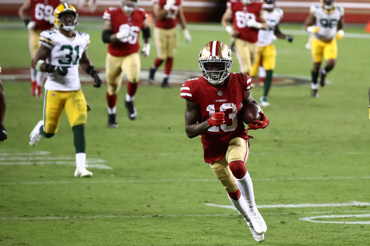 Richie James #13 of the San Francisco 49ers runs for a touchdown against the Green Bay Packers during the fourth quarter at Levi's Stadium in Santa Clara, Calif., on Nov. 5, 2020. (Ezra Shaw/Getty Images)