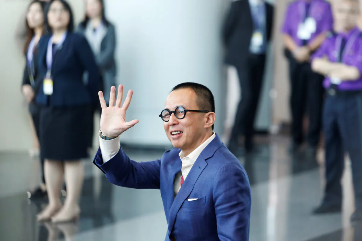 Richard Li, Hong Kong businessman and younger son of tycoon Li Ka-shing, waves as he arrives to vote during the election for Hong Kong's next Chief Executive in Hong Kong, on March 26, 2017.   (Bobby Yip/Reuters)