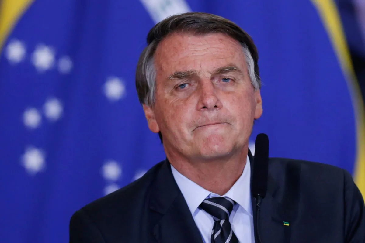 Brazil's President Jair Bolsonaro looks on during a ceremony at the Planalto Palace, in Brasilia, Brazil on Sept. 14, 2021. (Adriano Machado/Reuters)