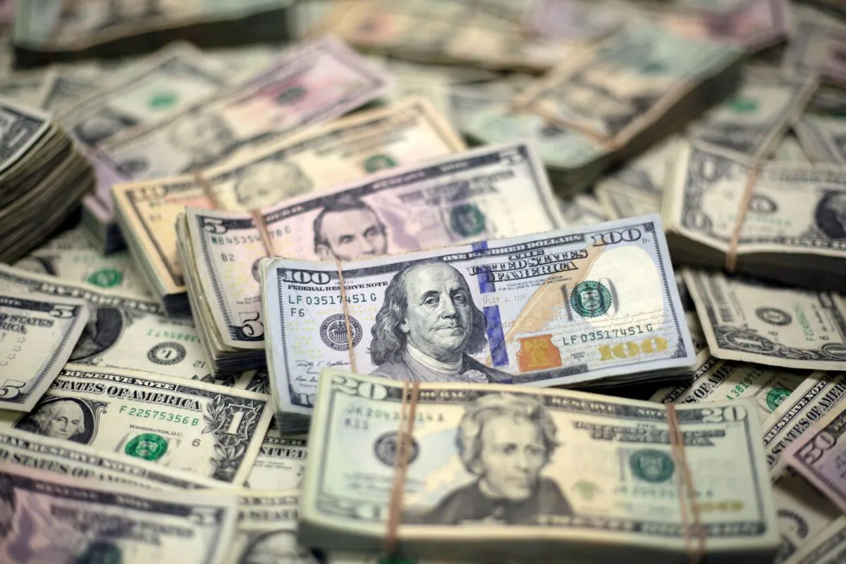 U.S. dollar banknotes are seen in this photo illustration taken on Feb. 12, 2018. (Jose Luis Gonzalez/Illustration/Reuters)