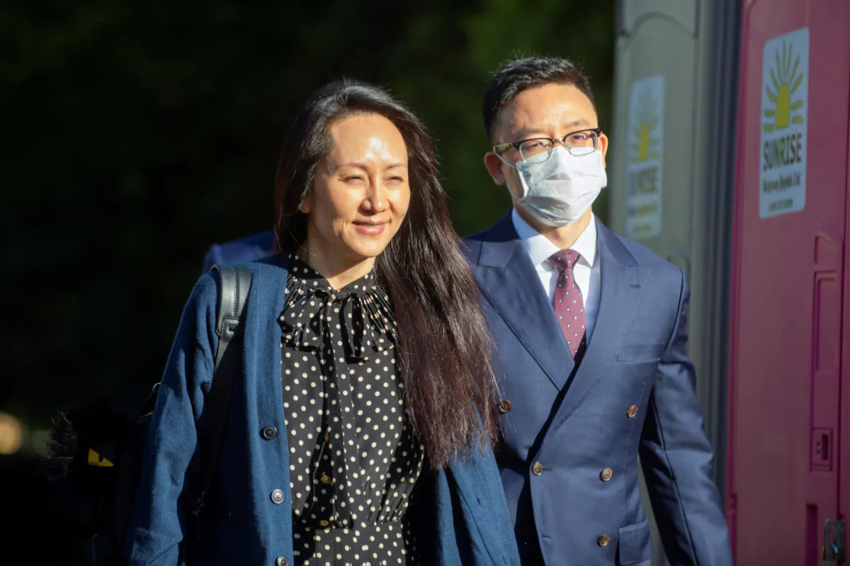 Huawei Technologies Chief Financial Officer Meng Wanzhou leaves her home to attend a court hearing in Vancouver, British Columbia, Canada on Sept. 24, 2021. (Taehoon Kim/Reuters)
