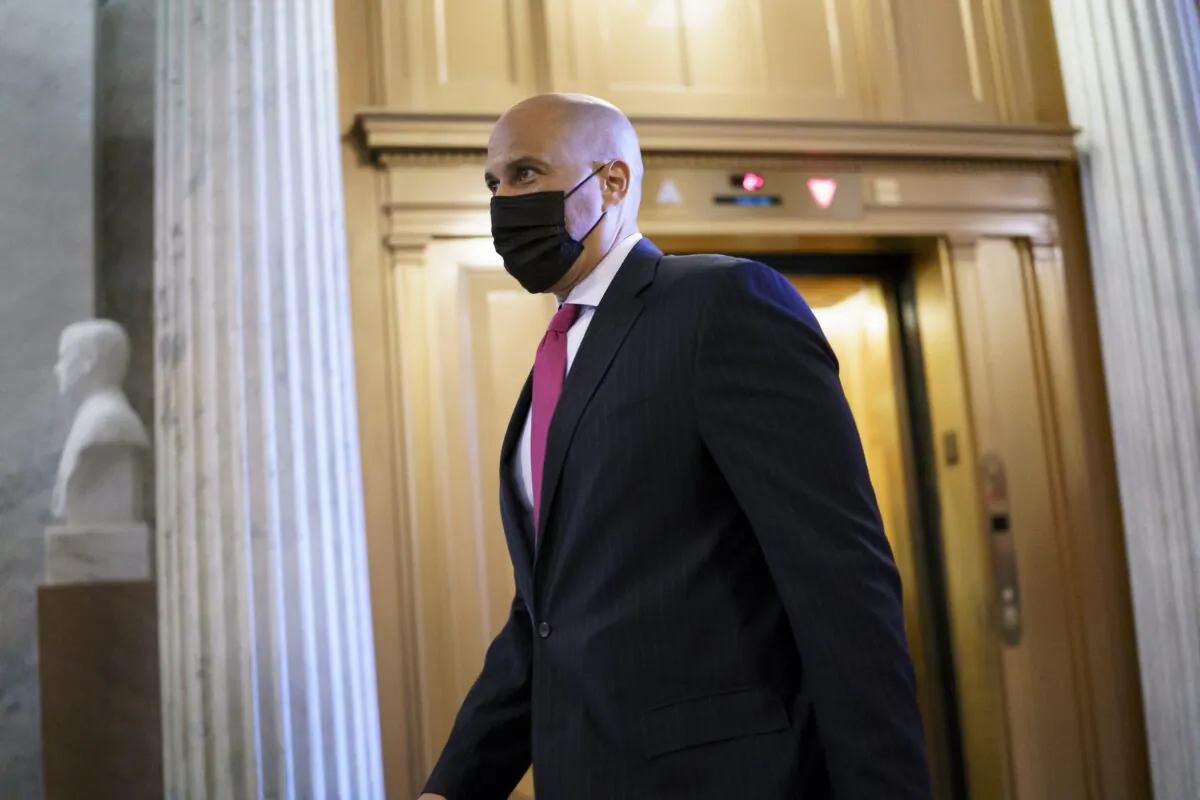 Sen. Cory Booker (D-N.J.) arrives at the Senate chamber at the Capitol in Washington on Sept. 22, 2021. (J. Scott Applewhite/AP Photo)