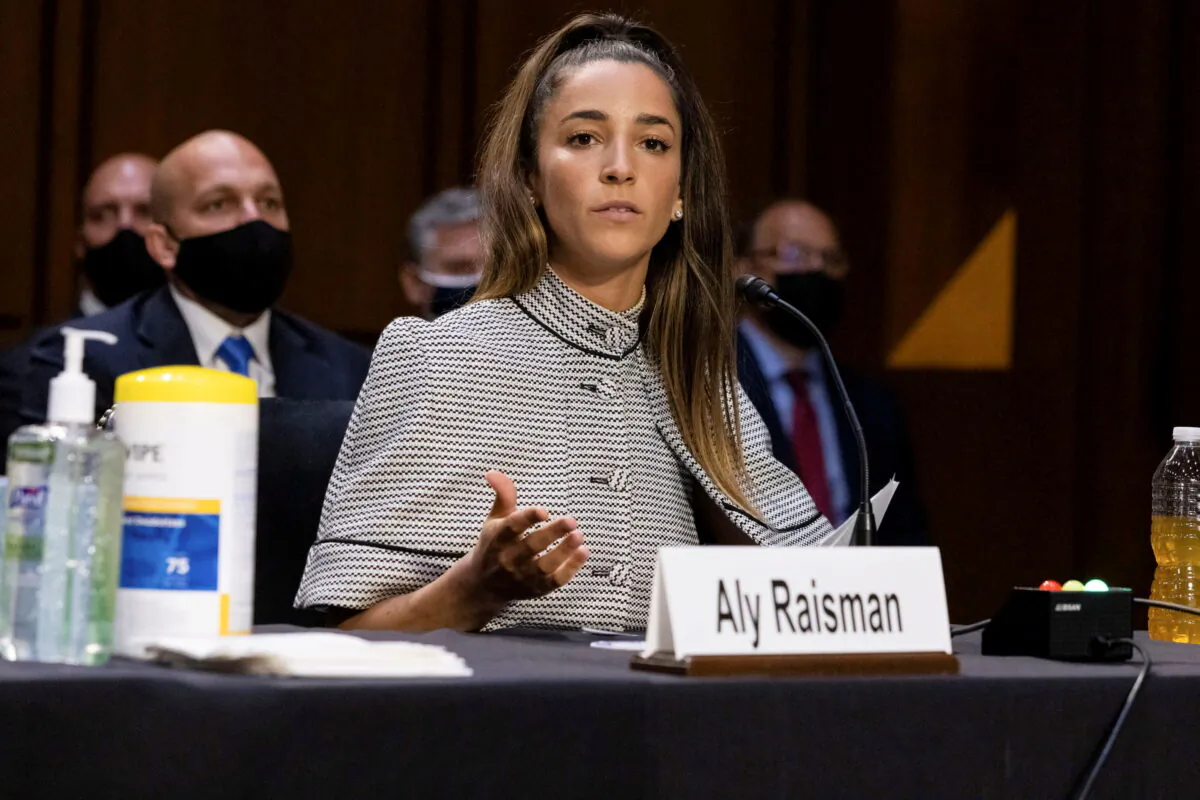 Olympic gymnast Aly Raisman testifies during a Senate Judiciary hearing about the Inspector General's report on the FBI handling of the Larry Nassar investigation of sexual abuse of Olympic gymnasts, on Capitol Hill, in Washington, D.C. on Sept. 15, 2021. (Graeme Jennings/Pool via Reuters)