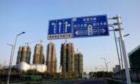 Fitch Lowers Evergrande Rating on Likely Missed Interest Payment