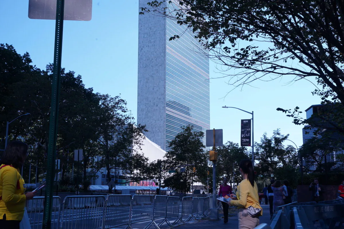 Falun Gong practitioners raise awareness about the persecution of their spiritual practice by the Chinese Communist Party in China, outside the U.N. building in New York, on Sept. 25, 2021. (Enrico Trigoso/The Epoch Times)