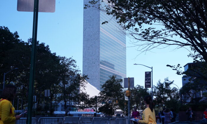 Falun Gong practitioners raise awareness about the persecution of their spiritual practice by the Chinese Communist Party in China, outside the U.N. building in New York, on Sept. 25, 2021. (Enrico Trigoso/The Epoch Times)