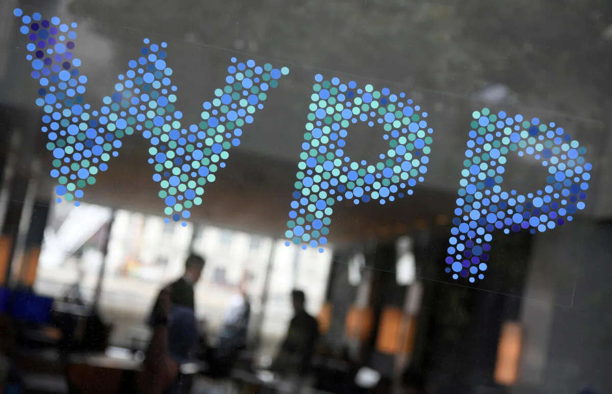 Branding signage for WPP, the largest global advertising and public relations agency, at its offices in London on July 17, 2019. (Toby Melville/Reuters)