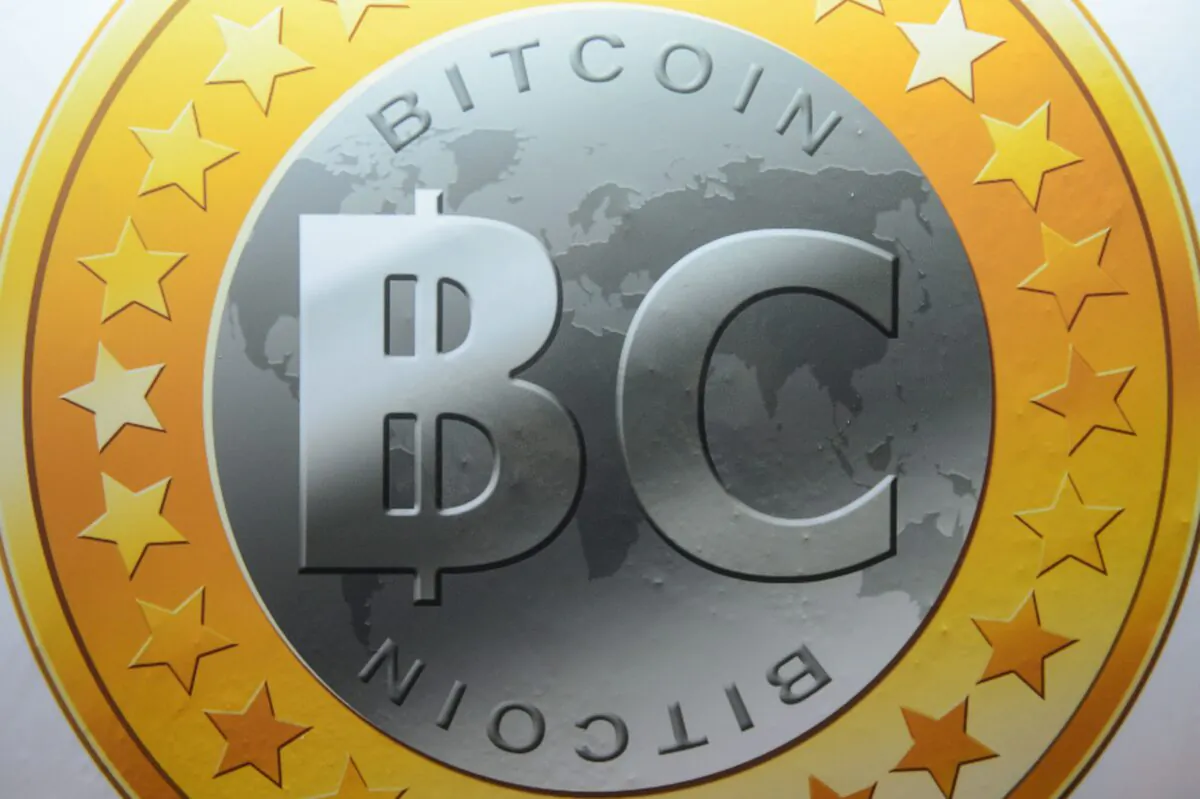 A Bitcoin sign is seen in Hong Kong, on Aug. 3, 2016. (Anthony Wallace/AFP via Getty Images)
