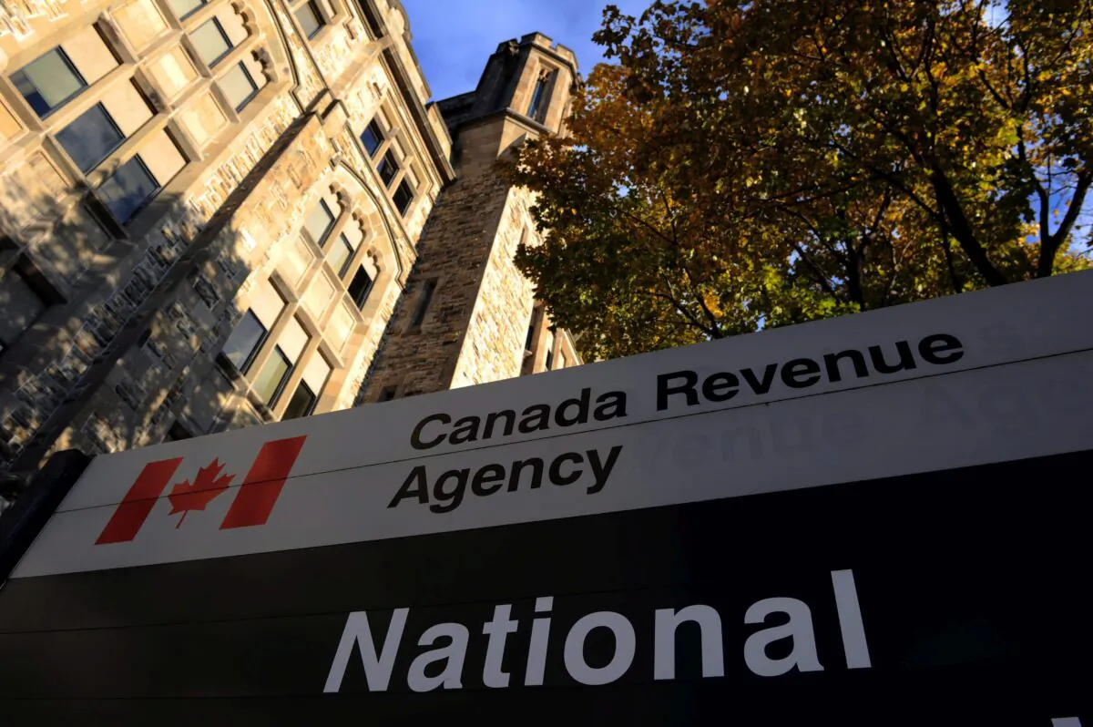 The Canada Revenue Agency headquarters in Ottawa in a 2011 file photo. Higher income-earning families in Canada pay the lion’s share of the country’s taxes, a new report suggests. (The Canadian Press/Sean Kilpatrick)