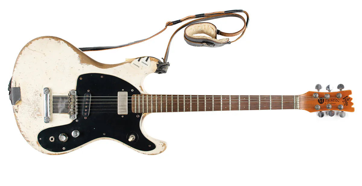 This Aug. 2021 photo provided by Boston-based RR Auction shows a 1965 Mosrite Ventures II electric guitar played by Johnny Ramone. (Nikki Brickett/RR Auction via AP)