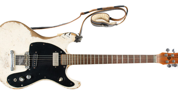 This Aug. 2021 photograph  provided by Boston-based RR Auction shows a 1965 Mosrite Ventures II electrical  guitar played by Johnny Ramone. (Nikki Brickett/RR Auction via AP)