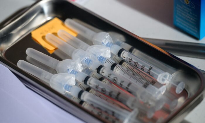 Syringes with a COVID-19 vaccine inside them are seen in New York City in a file photograph. (Angela Weiss/AFP via Getty Images)