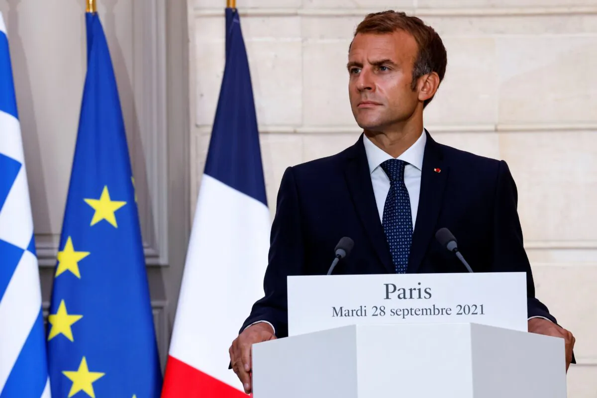 French President Emmanuel Macron gives a press conference with Greek Prime Minister during a signing ceremony of a new defence deal at The Elysee Palace in Paris, France, on Sept. 28, 2021. (Ludovic Marin/Pool via Reuters)