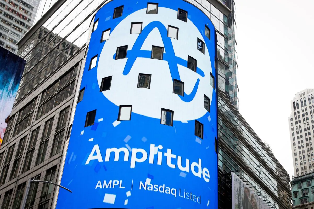 A screen announces Amplitude’s direct listing outside the Nasdaq Market in Times Square in New York City on Sept. 28, 2021. (Brendan McDermid/Reuters)