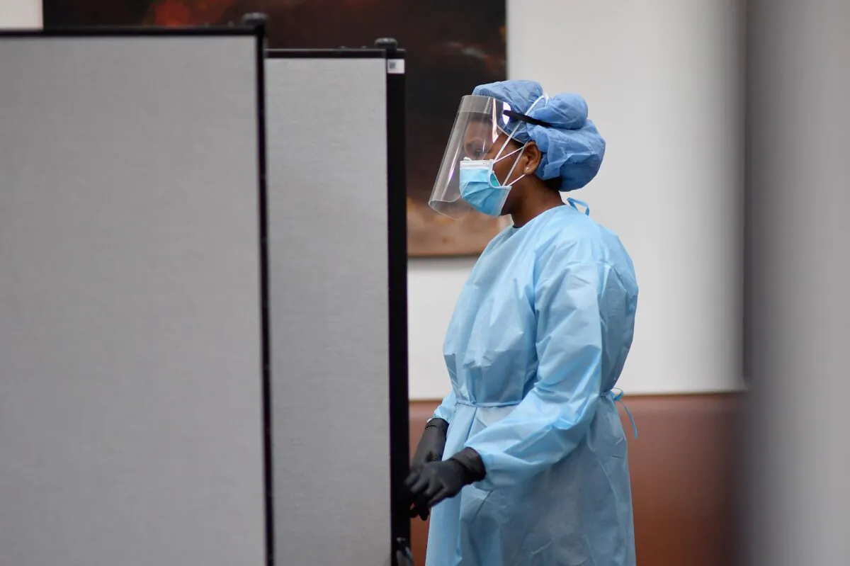 A registered nurse waits to test residents for COVID-19 antibodies at Abyssinian Baptist Church in the Harlem neighborhood of New York City on May 14, 2020. (Angela Weiss/AFP via Getty Images)