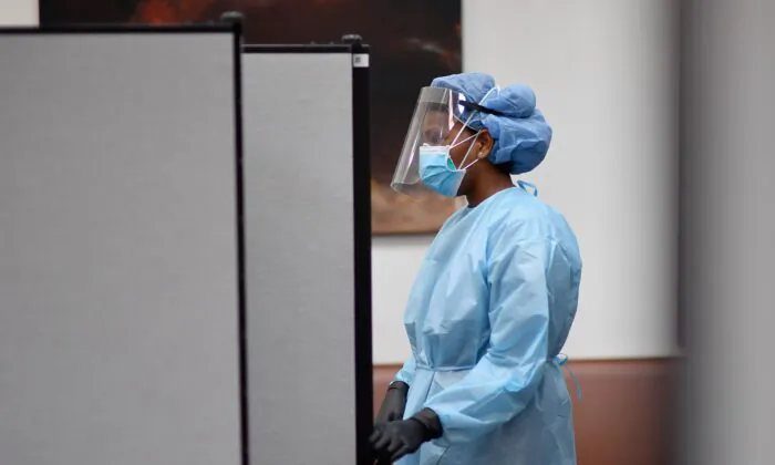 A registered nurse waits to test residents for COVID-19 antibodies at Abyssinian Baptist Church in the Harlem neighborhood of New York City on May 14, 2020. (Angela Weiss/AFP via Getty Images)