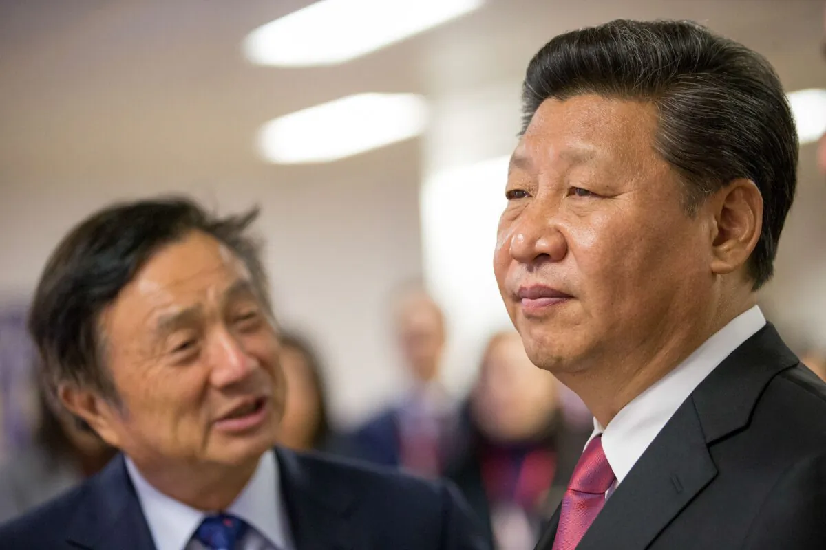 Chinese leader Xi Jinping (R) is shown around the offices of Chinese telecom giant Huawei by its president and founder Ren Zhengfei in London, England, during Xi's state visit to the UK on Oct. 21, 2015.  (Matthew Lloyd/AFP via Getty Images)