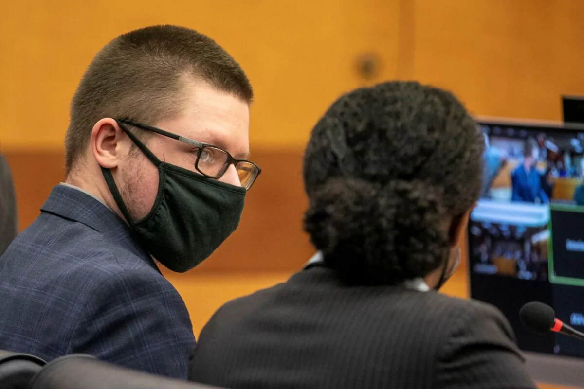 Robert Aaron Long appears in front of Fulton County Superior Court Judge Ural Glanville at the Fulton County Courthouse in downtown Atlanta on Monday, Aug. 30, 2021. (Alyssa Pointer/Atlanta Journal Constitution via AP)